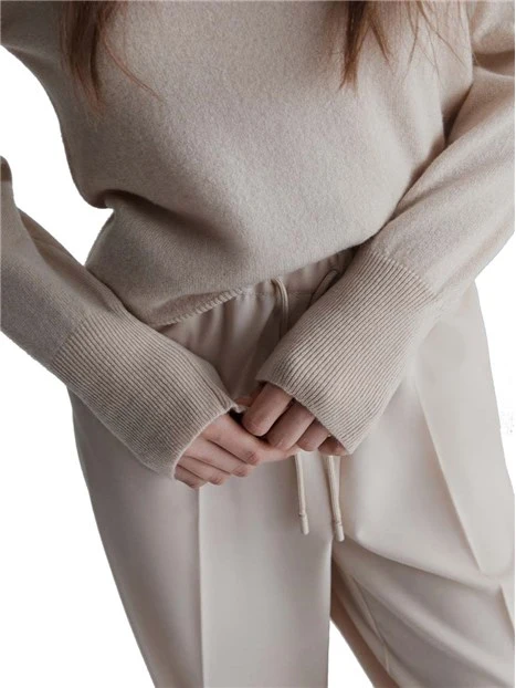 MAGLIA GIROCOLLO IN CASHMERE CON SPACCHI LATERALI DONNA BIANCO