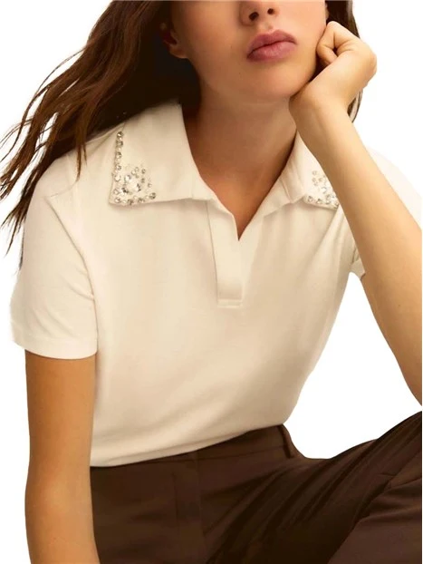 POLO IN PIQUET CON APERTURA A V DONNA BIANCO