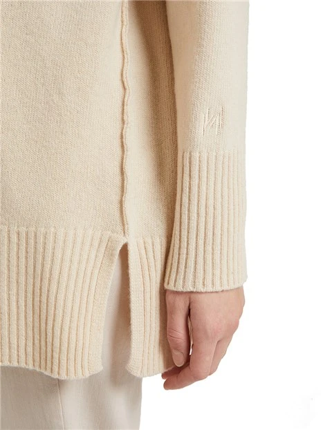 DOLCEVITA IN LANA CON SPACCHI DONNA BIANCO
