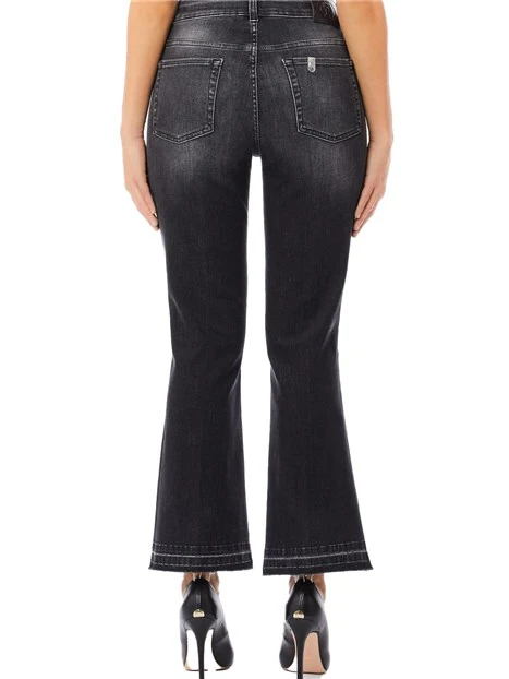 JEANS CON ORLO SFRANGIATO DONNA NERO