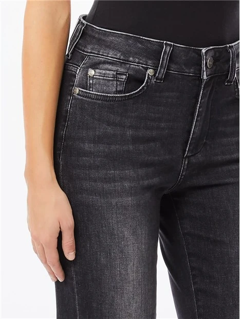 JEANS CON ORLO SFRANGIATO DONNA NERO