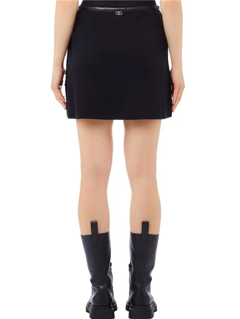 GONNA CORTA IN MAGLIA CON FIBBIE REGOLABILI DONNA NERO