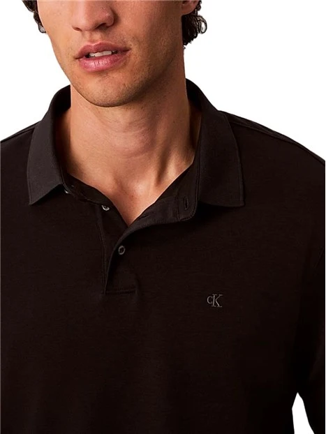 POLO MANICA LUNGA CON SPACCHETTI LATERALI  UOMO NERO