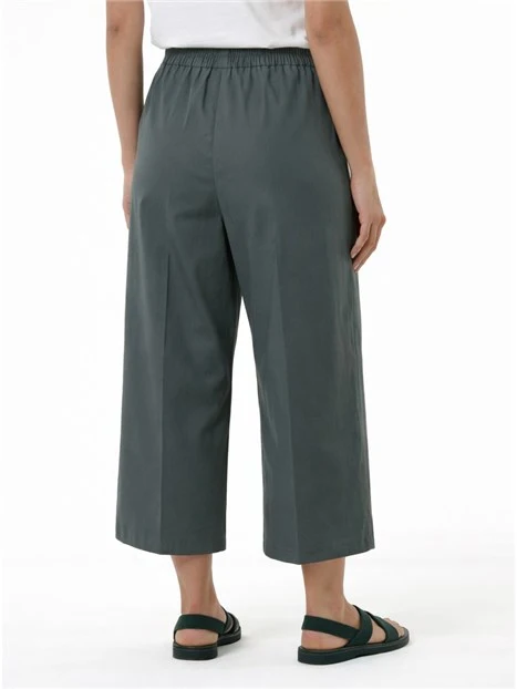 PANTALONE PALAZZO CON TASCHE A FILETTO E INSERTO ELASTICO SUL RETRO DONNA VERDE
