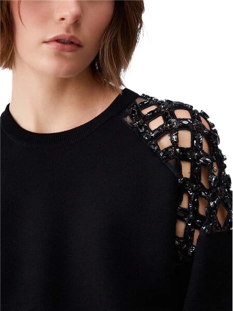MAGLIA GIROCOLLO CON SPALLA TRAFORATA DONNA NERO