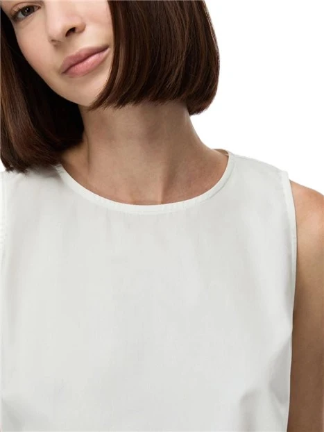 TOP IN COTONE CON BALZA SUL FONDO DONNA BIANCO