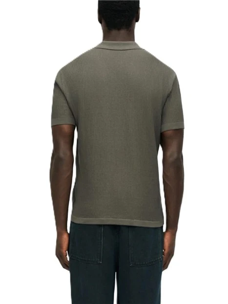POLO MANICA CORTA CON MOTIVO ALL OVER A RILIEVO UOMO VERDE